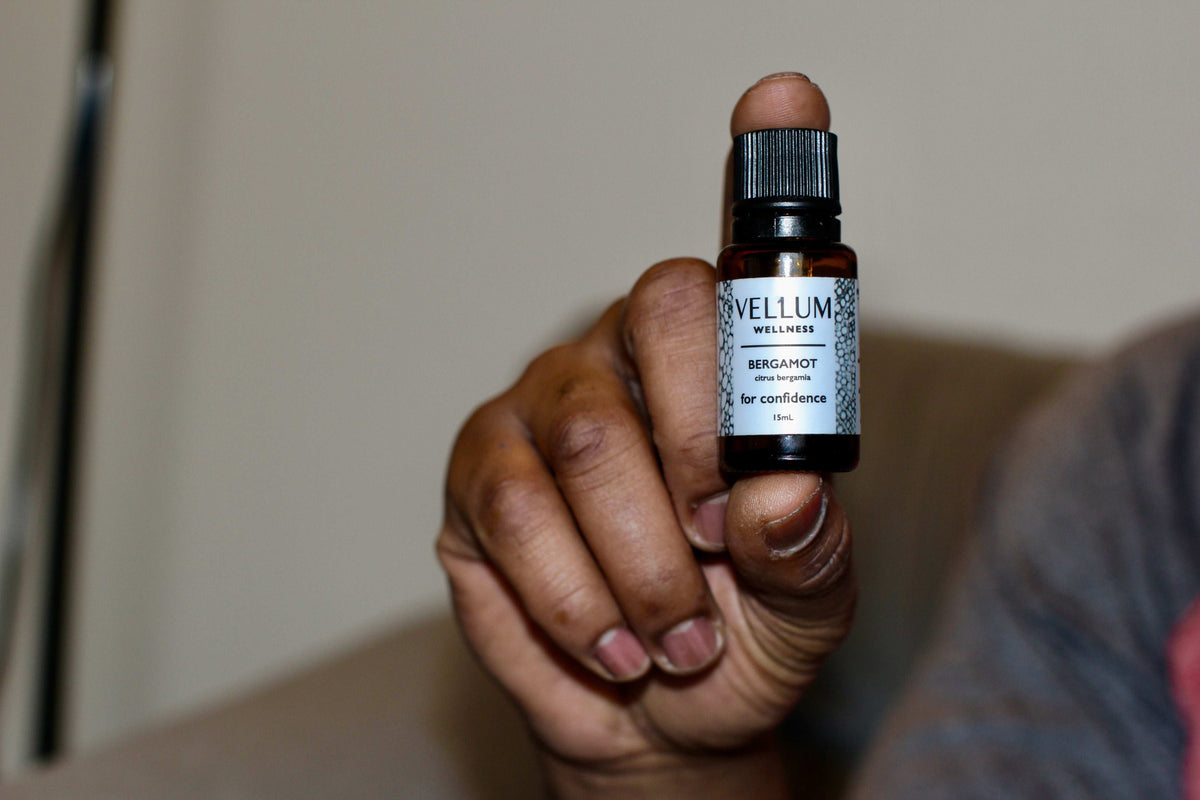 Pure Bergamot Essential Oil by Vellum Wellness, uplifting citrus aroma from Italy, bergapten-free for safe daytime skin use, boosts confidence and balances acne-prone skin, 15mL bottle.