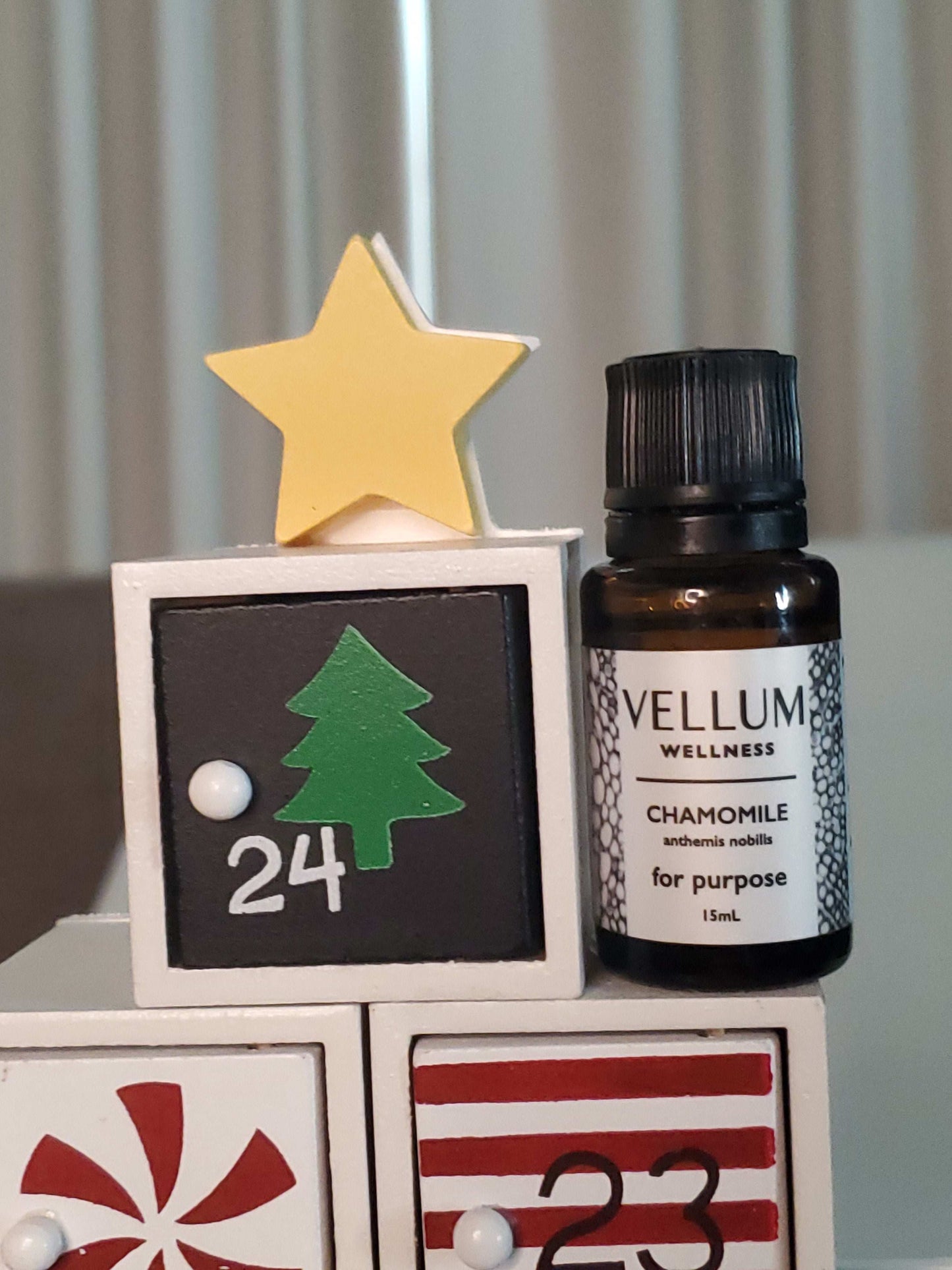 Pure Chamomile Essential Oil by Vellum Wellness, soothing floral aroma for calming anxiety and promoting restful sleep, eases skin irritation and inflammation, 15mL bottle.