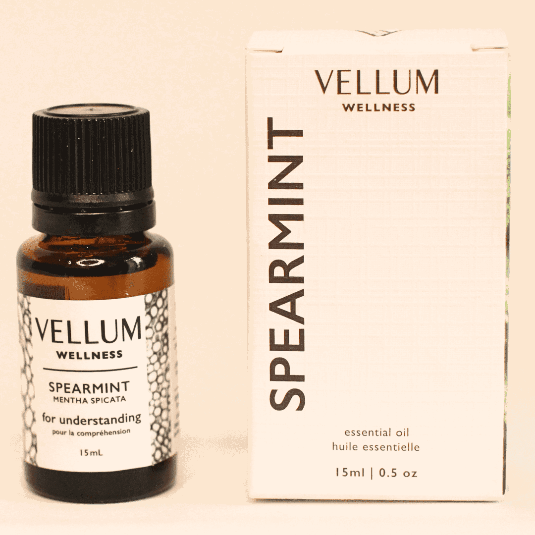 Pure Spearmint Essential Oil by Vellum Wellness, refreshing minty aroma uplifts mood boosts focus and energy, soothes digestion clears sinuses supports skin clarity, 15mL bottle.