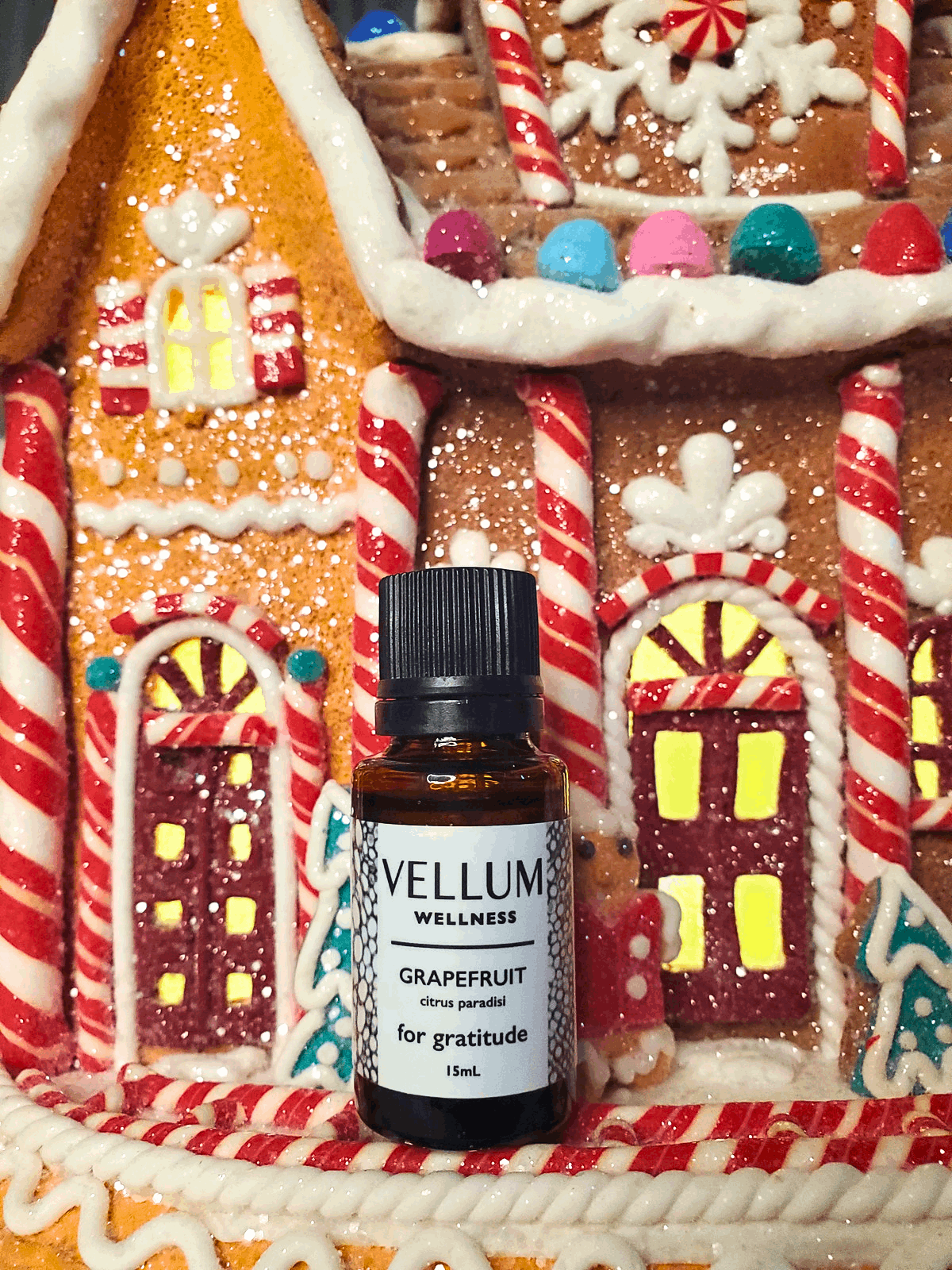 Pure Grapefruit Essential Oil by Vellum Wellness, fresh uplifting citrus aroma boosts energy and gratitude, tones skin fades scars and acne, 15mL bottle.