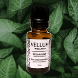 Pure Spearmint Essential Oil by Vellum Wellness, refreshing minty aroma uplifts mood boosts focus and energy, soothes digestion clears sinuses supports skin clarity, 15mL bottle.